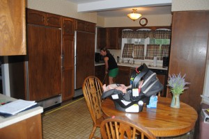 The original kitchen (with my saintly friend K who helped us through this mess).